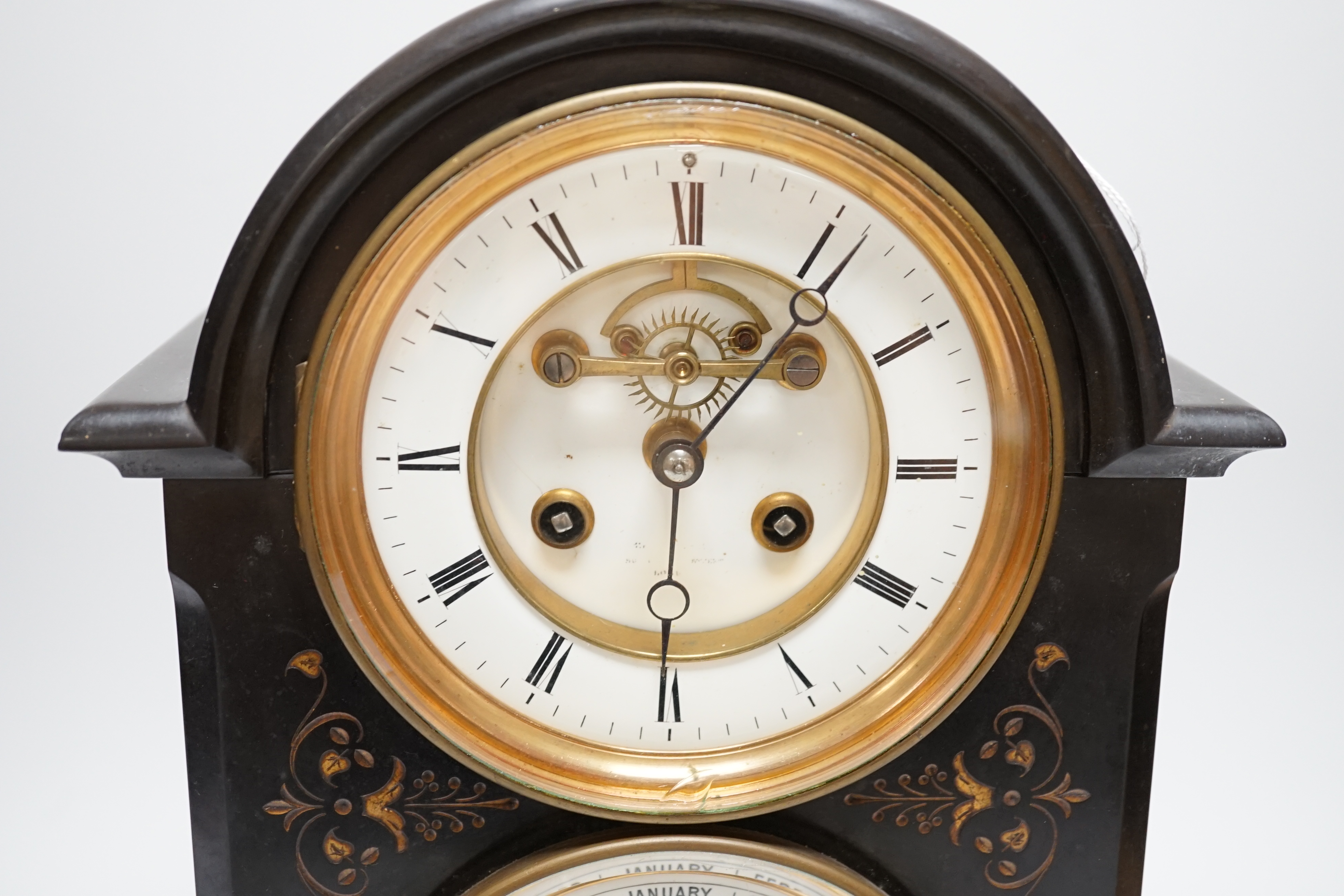 A late 19th century French black slate mantel clock with brocot style escapement and second dial with calendar work, 39.3cm high